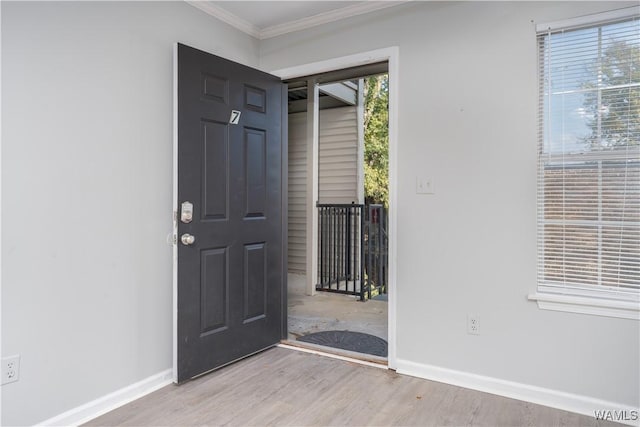1721 Hackberry Ln Unit 6, Tuscaloosa, AL 35401 - foyer with ornamental molding, baseboards, and wood finished floors