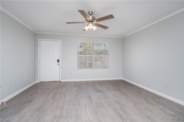 1721 Hackberry Ln Unit 6, Tuscaloosa, AL 35401 - unfurnished room with ceiling fan, baseboards, wood finished floors, and ornamental molding