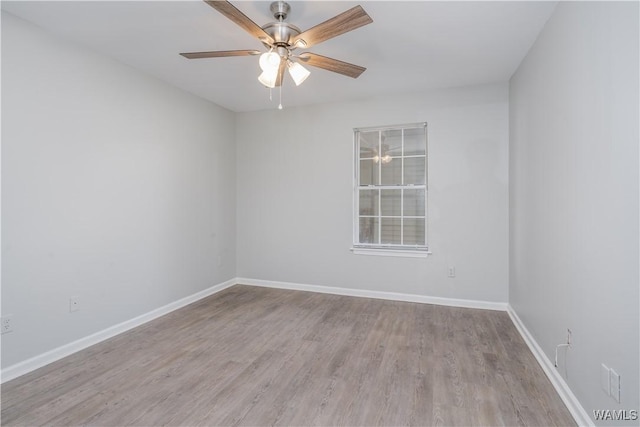 1721 Hackberry Ln Unit 6, Tuscaloosa, AL 35401 - unfurnished room featuring wood finished floors, ceiling fan, and baseboards