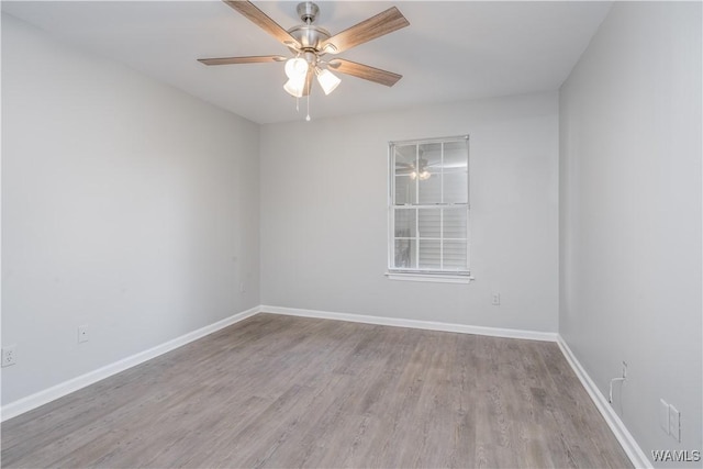 1721 Hackberry Ln Unit 6, Tuscaloosa, AL 35401 - empty room featuring a ceiling fan, wood finished floors, and baseboards