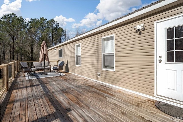 deck with outdoor lounge area