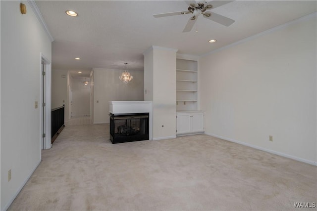 unfurnished living room featuring baseboards, recessed lighting, a multi sided fireplace, light carpet, and crown molding