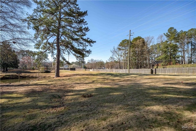 view of yard with fence