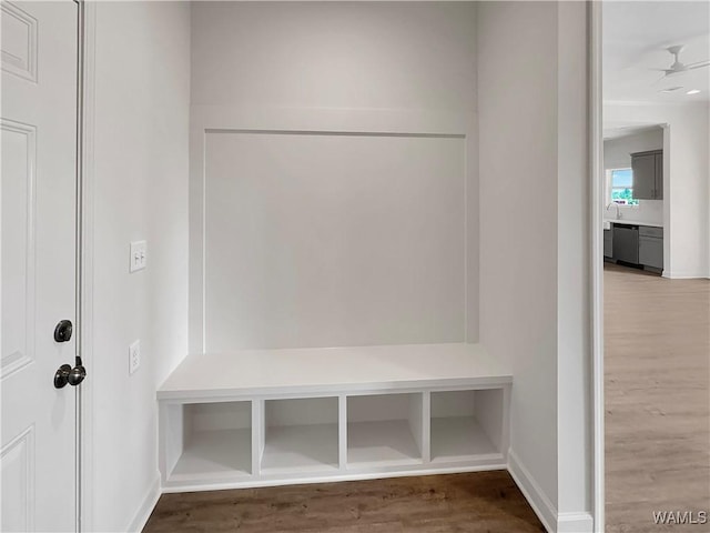 mudroom with hardwood / wood-style flooring and ceiling fan