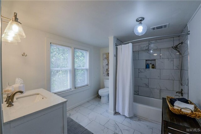 3216 34th Ave, Northport, AL 35476 - bathroom with marble look tile flooring, toilet, vanity, shower / tub combo with curtain, and baseboards