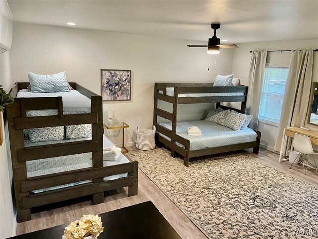 3216 34th Ave, Northport, AL 35476 - bedroom featuring wood finished floors, baseboards, recessed lighting, and a ceiling fan