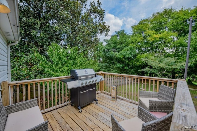3216 34th Ave, Northport, AL 35476 - wooden terrace with a grill and view of scattered trees