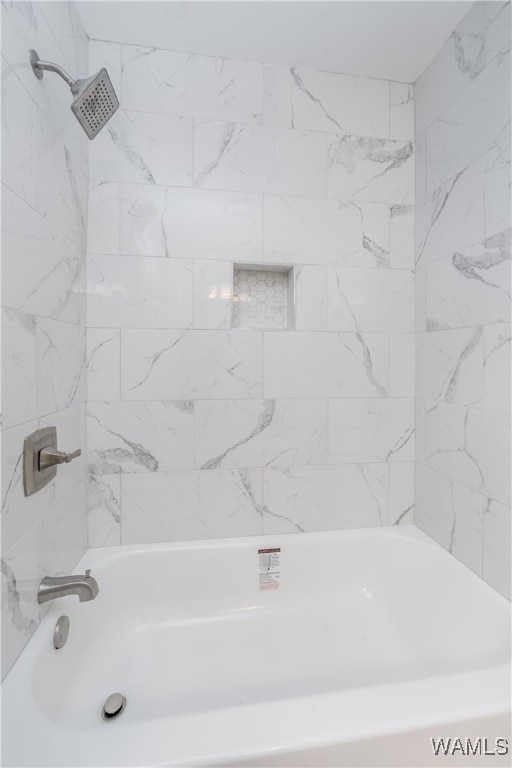 bathroom featuring bathing tub / shower combination