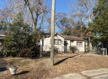 view of front of house with fence