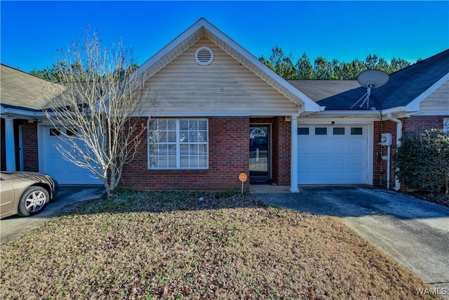 ranch-style house with an attached garage, concrete driveway, and brick siding