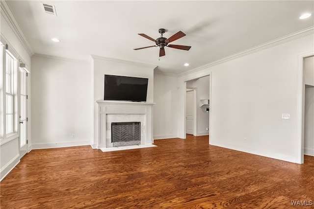 unfurnished living room with wood-type flooring, ceiling fan, and ornamental molding