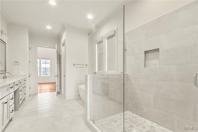 bathroom with hardwood / wood-style floors, vanity, shower with separate bathtub, and ornamental molding