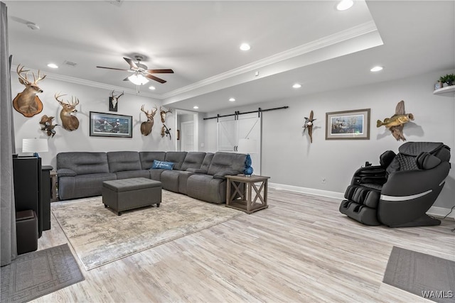 10488 Nicole St, Vance, AL 35490 - living area with a barn door, ornamental molding, a ceiling fan, light wood-style floors, and recessed lighting