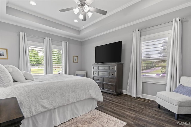 10488 Nicole St, Vance, AL 35490 - bedroom with dark wood-style flooring, crown molding, a tray ceiling, recessed lighting, and ceiling fan
