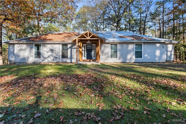 ranch-style house with a front lawn