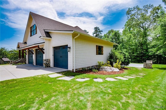 10300 Legacy Ln, Northport, AL 35475 - view of side of home with a yard, a shingled roof, and driveway