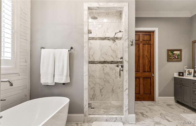 10300 Legacy Ln, Northport, AL 35475 - full bath with marble finish flooring, a shower stall, a freestanding bath, and crown molding