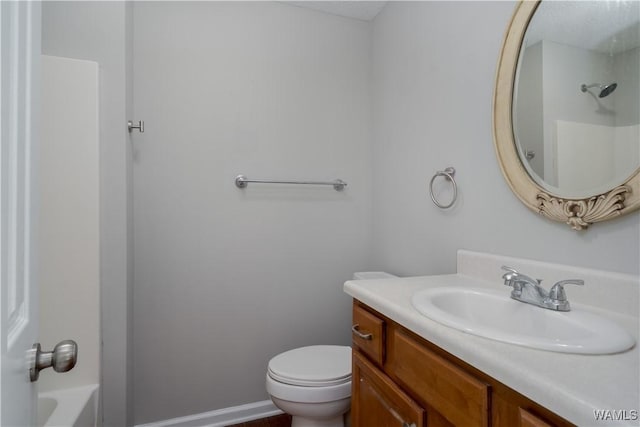 bathroom with vanity, a bath, toilet, and a shower