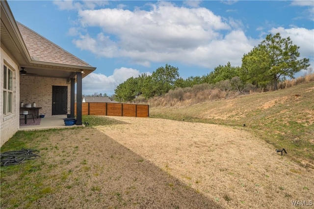 view of yard with a patio area and fence