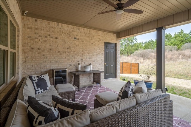 view of patio / terrace featuring a ceiling fan and an outdoor hangout area