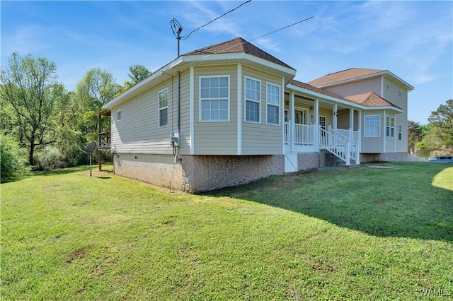 44 Maddox Rd, Nauvoo, AL 35578 - view of side of property with a yard, a porch, crawl space, and roof with shingles