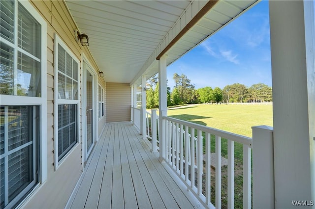 44 Maddox Rd, Nauvoo, AL 35578 - wooden deck with covered porch and a lawn