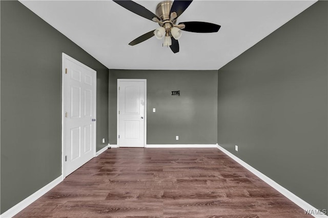 44 Maddox Rd, Nauvoo, AL 35578 - spare room with ceiling fan, wood finished floors, and baseboards