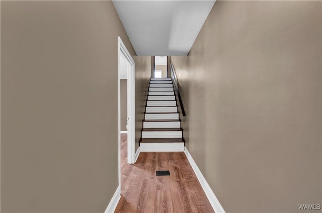 44 Maddox Rd, Nauvoo, AL 35578 - staircase featuring visible vents, baseboards, and wood finished floors