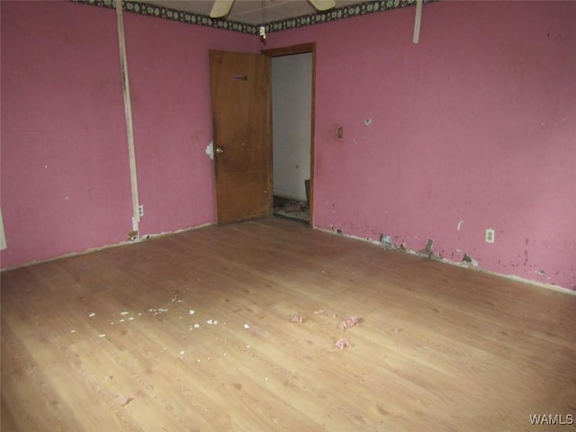 empty room featuring wood finished floors