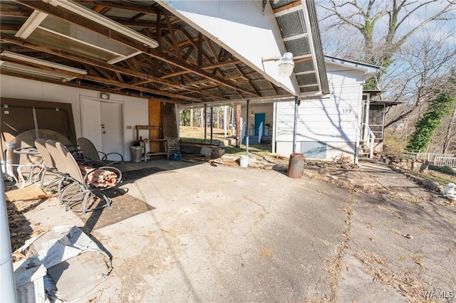 exterior space featuring a carport
