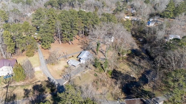 aerial view with a wooded view