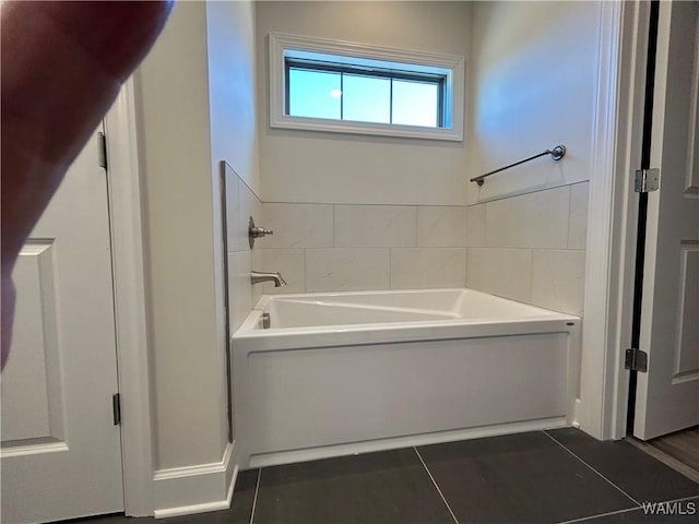 13761 Blackoak Dr, Northport, AL 35475 - bathroom featuring tile patterned floors and a bath