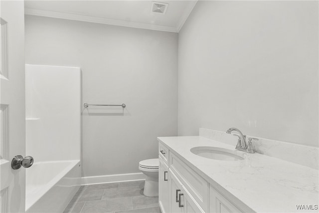 bathroom with tile patterned flooring, vanity, toilet, and crown molding