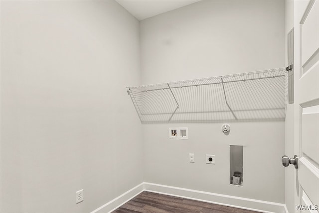 clothes washing area with gas dryer hookup, washer hookup, dark hardwood / wood-style floors, and hookup for an electric dryer