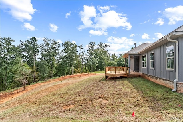 view of yard with a deck