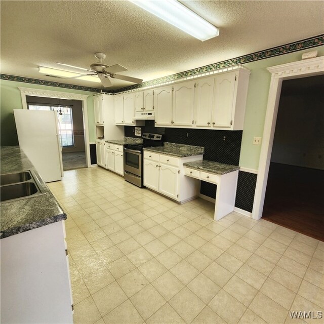 kitchen with white cabinetry, sink, ceiling fan, a textured ceiling, and stainless steel range with electric cooktop