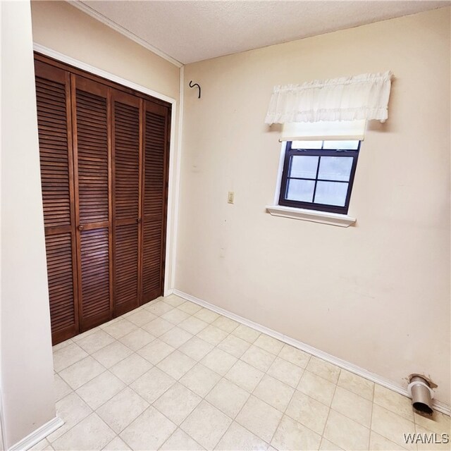 unfurnished bedroom with a closet