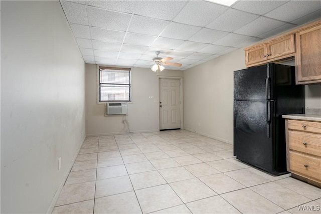 1212 12th St Unit 35, Tuscaloosa, AL 35401 - kitchen featuring light tile patterned floors, ceiling fan, light countertops, a paneled ceiling, and freestanding refrigerator