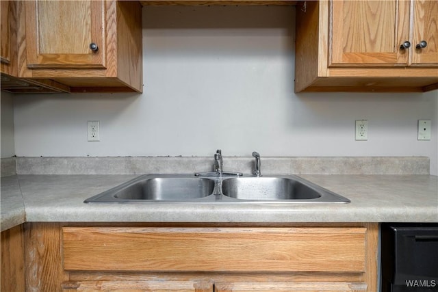 1212 12th St Unit 35, Tuscaloosa, AL 35401 - kitchen featuring light countertops, a sink, and black dishwasher