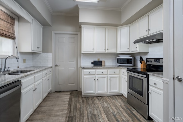 kitchen with white cabinets, sink, dark wood-type flooring, and appliances with stainless steel finishes