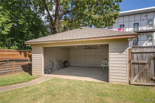 garage with a lawn