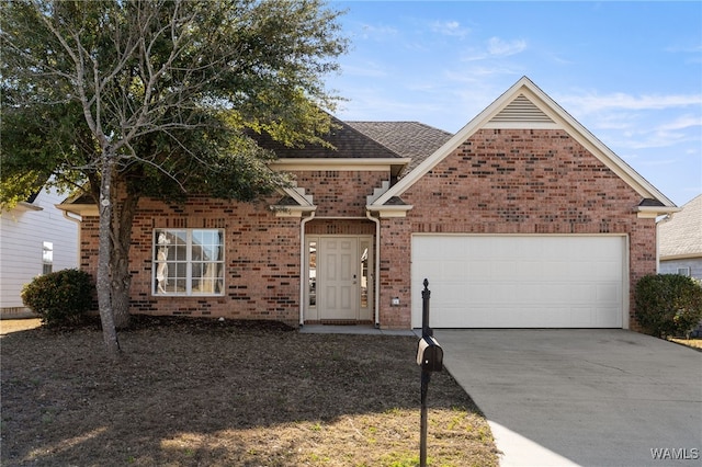 view of front facade featuring brick siding, driveway, and an attached garage