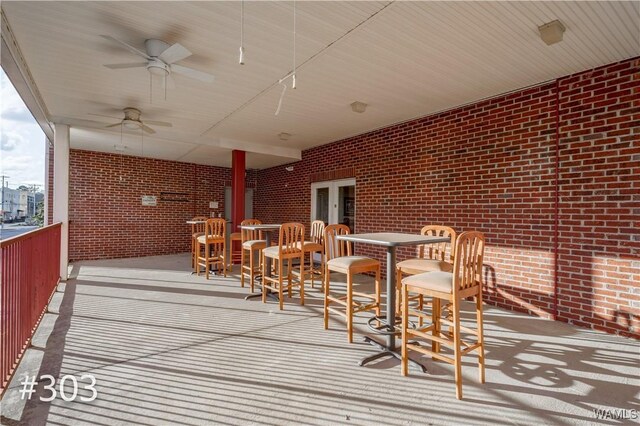 712 Frank Thomas Ave Unit 303, Tuscaloosa, AL 35401 - view of patio / terrace with outdoor dining area and a ceiling fan