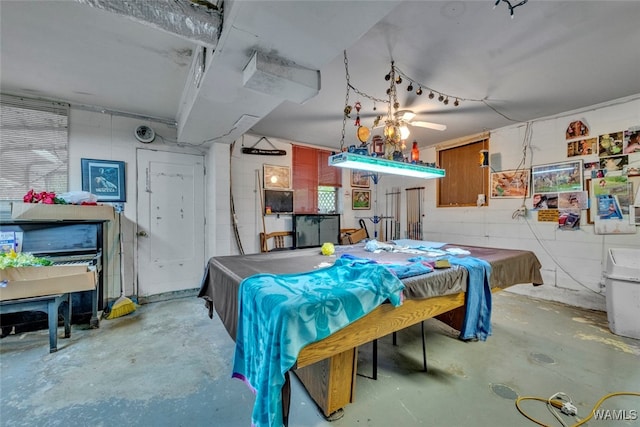 dining space with ceiling fan and pool table