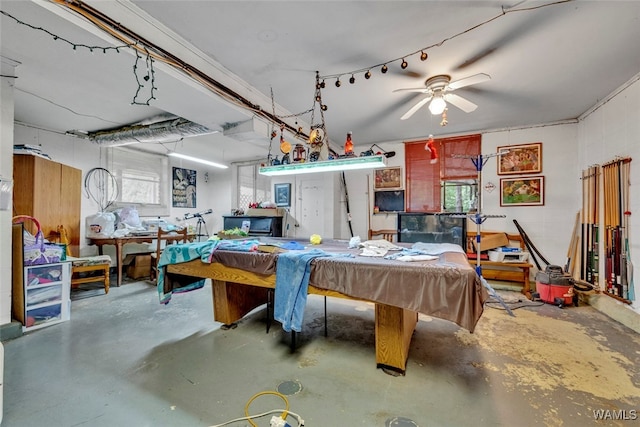 game room featuring ceiling fan, concrete flooring, and pool table