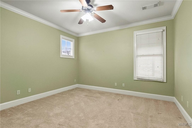 unfurnished room with light carpet, ceiling fan, and ornamental molding