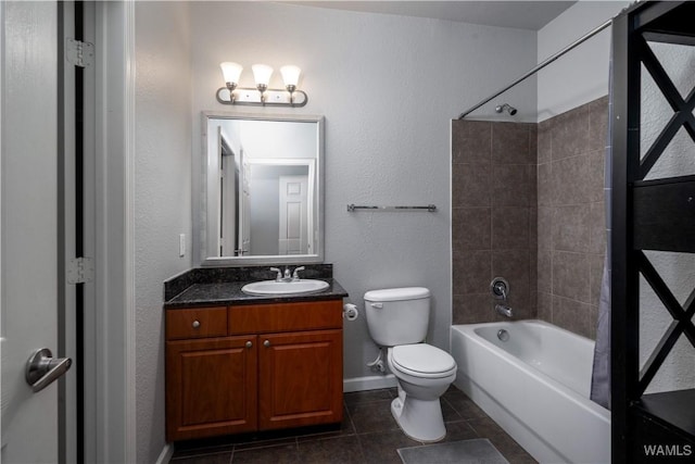 600 13th St E Unit 532, Tuscaloosa, AL 35401 - full bathroom featuring toilet, tile patterned floors,  shower combination, vanity, and baseboards