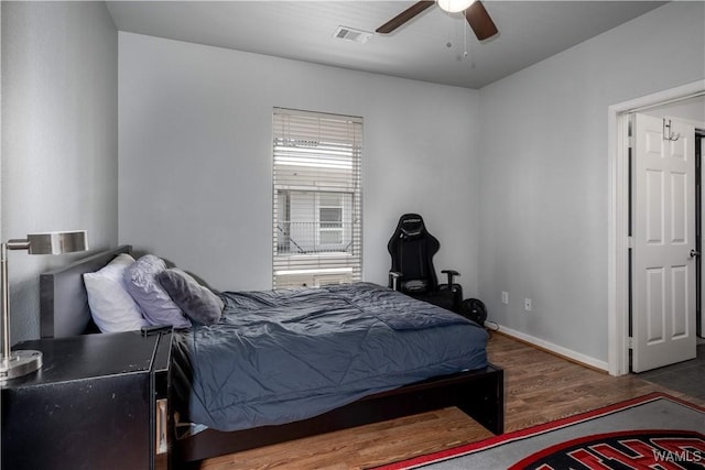 600 13th St E Unit 532, Tuscaloosa, AL 35401 - bedroom featuring wood finished floors, baseboards, and ceiling fan