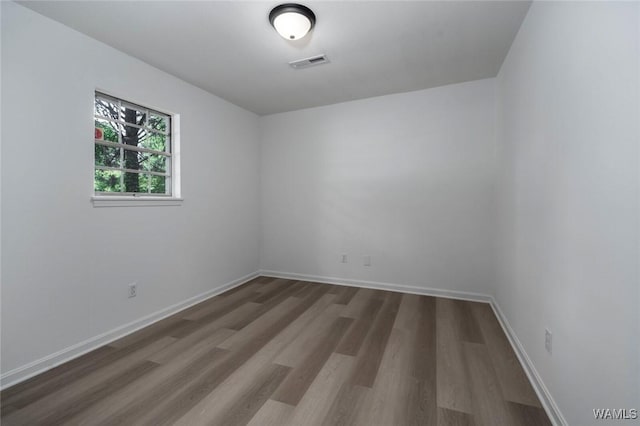 4205 Cloverdale Est, Northport, AL 35473 - unfurnished room featuring wood finished floors and baseboards