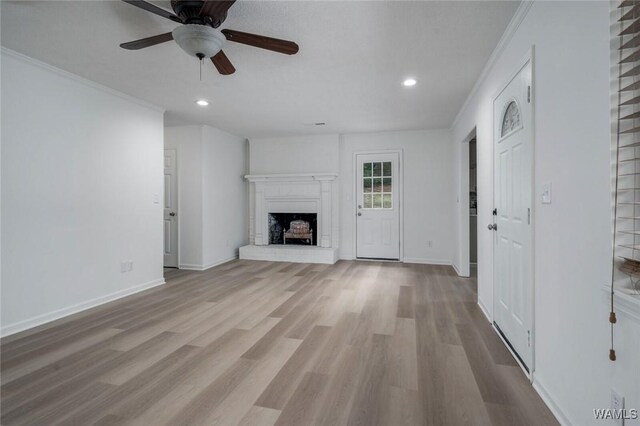 4205 Cloverdale Est, Northport, AL 35473 - unfurnished living room featuring recessed lighting, crown molding, a ceiling fan, wood finished floors, and baseboards